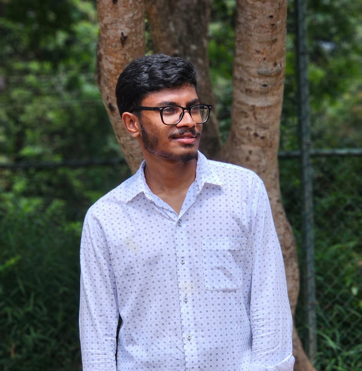 Professional headshot of Pramodika Dulanja